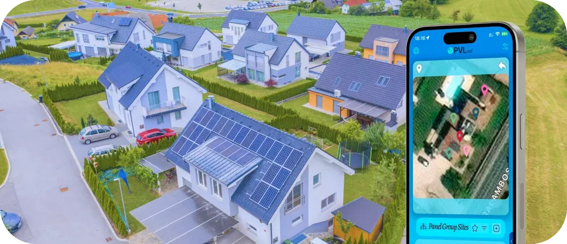 Aerial view of houses with solar panels and phone showing site setup